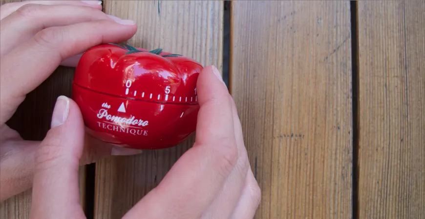 A 'pomodoro' kitchen timer, after which the method is named